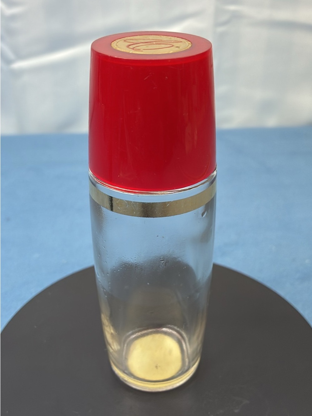 Avon Clear Glass Bottle with Red Cap and Gold Band